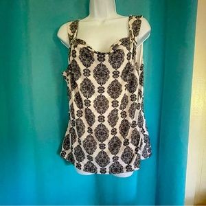 Sleeveless lined with gold bars to add to the collection